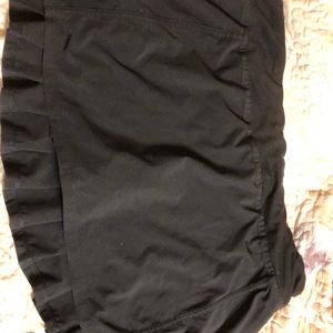 black fabletics tennis skirt